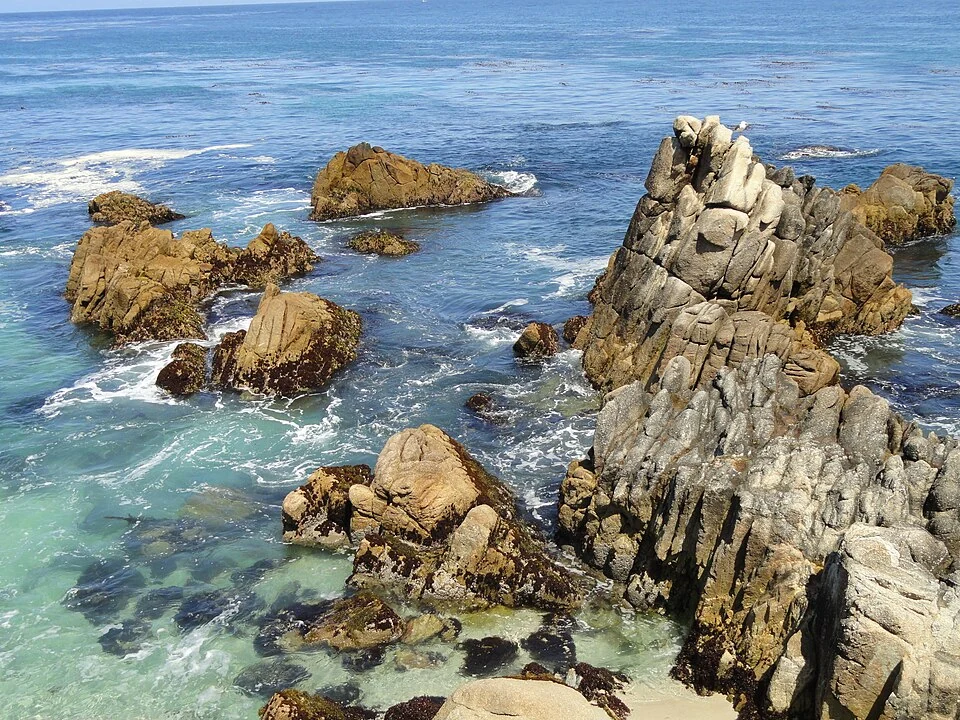 Waves and coastal rocks at Lovers Point in Pacific Grove